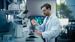 worker in pharmaceutical lab worker in pharmaceutical lab