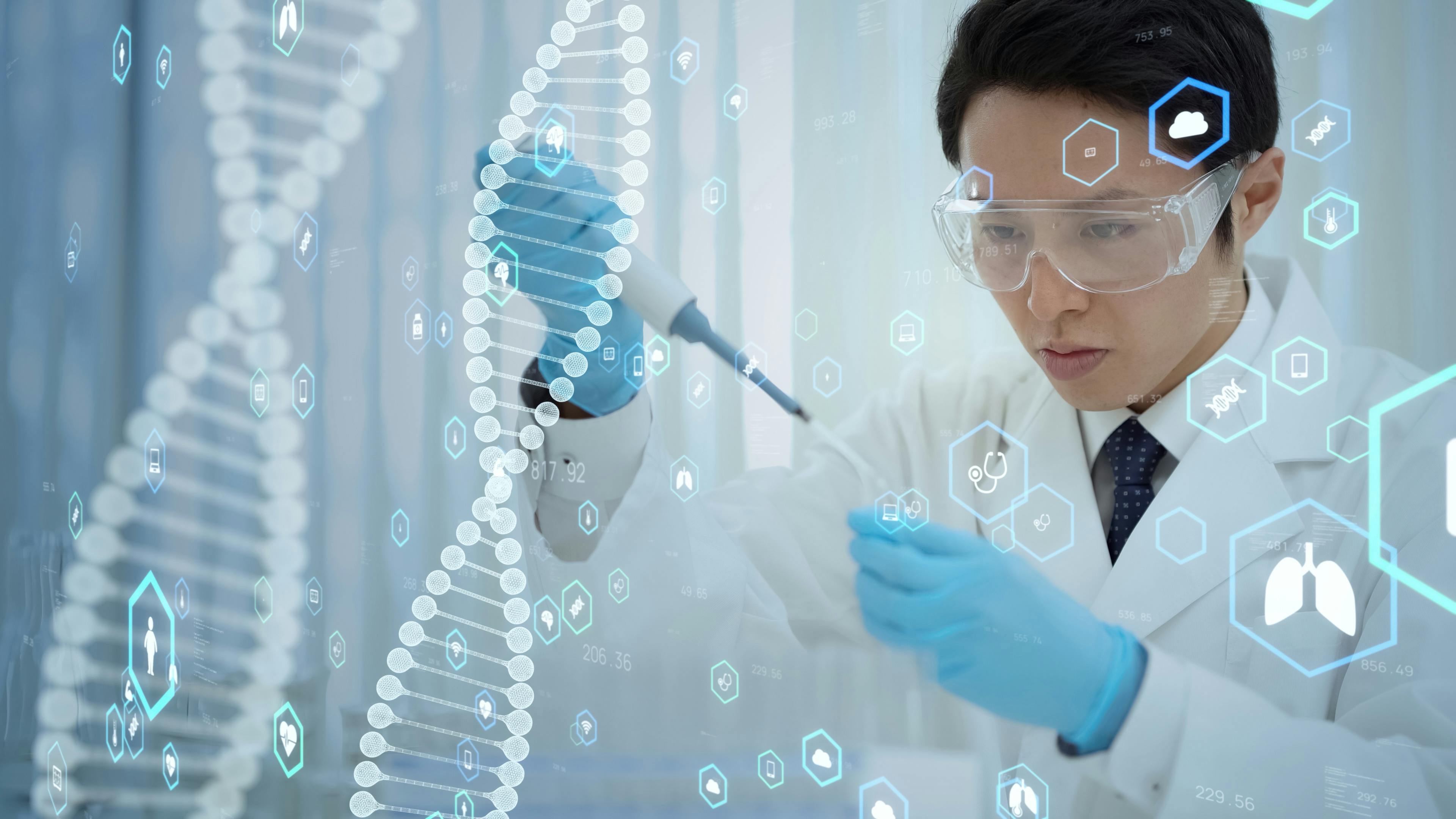Digital DNA strands and medical and anatomy icons transposed over image of male clinical researcher