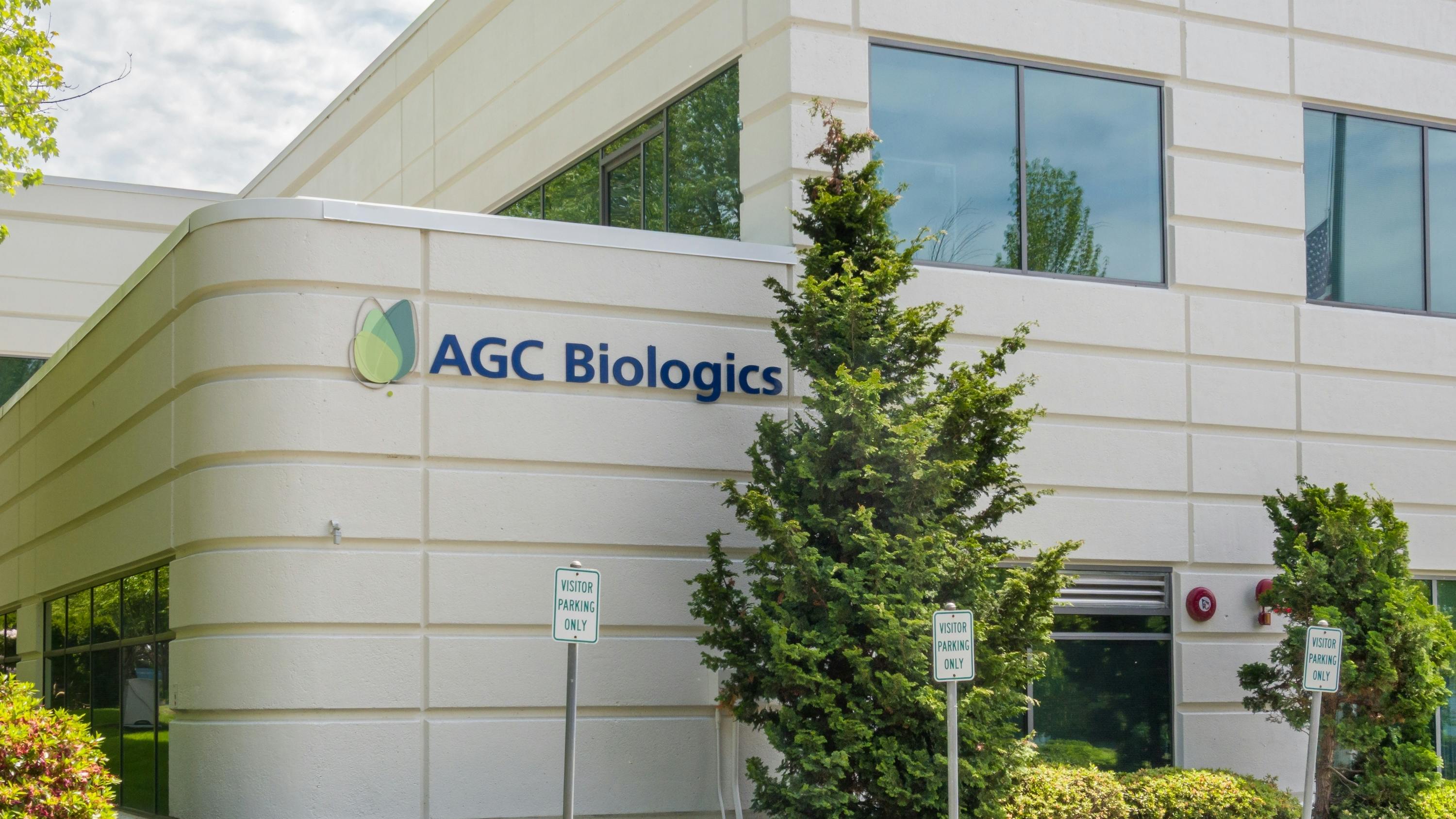 AGC Biologics laboratory exterior and trademark logo.