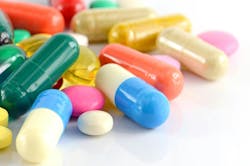 Colorful closeup of oral medications on White Background. Colorful closeup of oral medications on White Background.