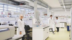 Workers in laboratory at Valanx Biotech in Vienna, Austria Workers in laboratory at Valanx Biotech in Vienna, Austria