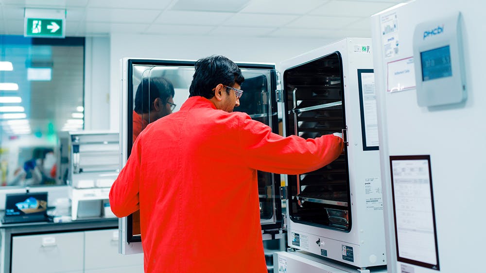 pharma worker in AAV viral vector manufacturing lab