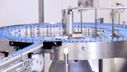 Rows of bottles on a pharmaceutical packaging line Rows of bottles on a pharmaceutical packaging line