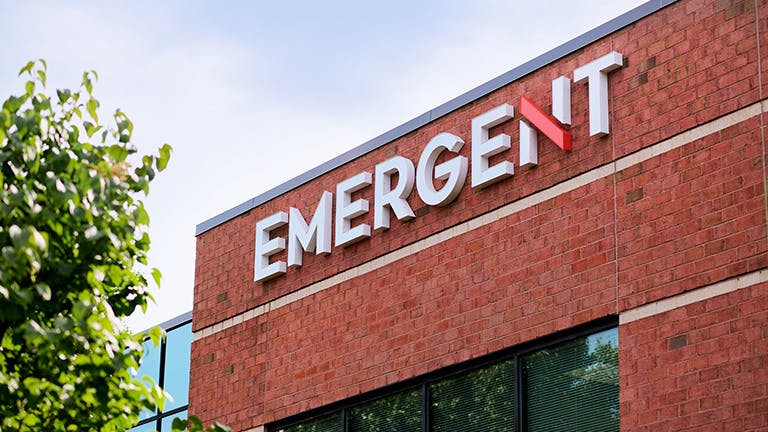 Emergent logo on brick building