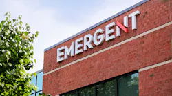Emergent logo on brick building