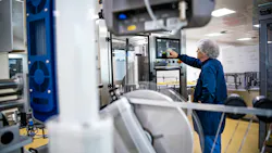 Bavarian Noridic operator at controls for vaccine manufacturing Bavarian Noridic operator at controls for vaccine manufacturing