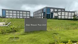 Exterior view of Shilpa Biologics sign with buildings in the background Exterior view of Shilpa Biologics sign with buildings in the background