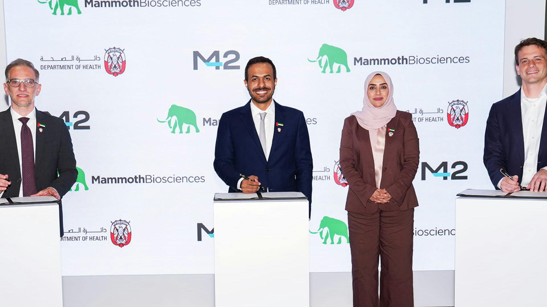 Executives pose while signing memorandum of agreement for M42, Mammoth Biosciences and Abu Dubai partnership