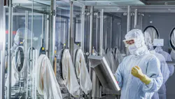 ADC filling line with worker in PPE at Altruist Biologics' China facility