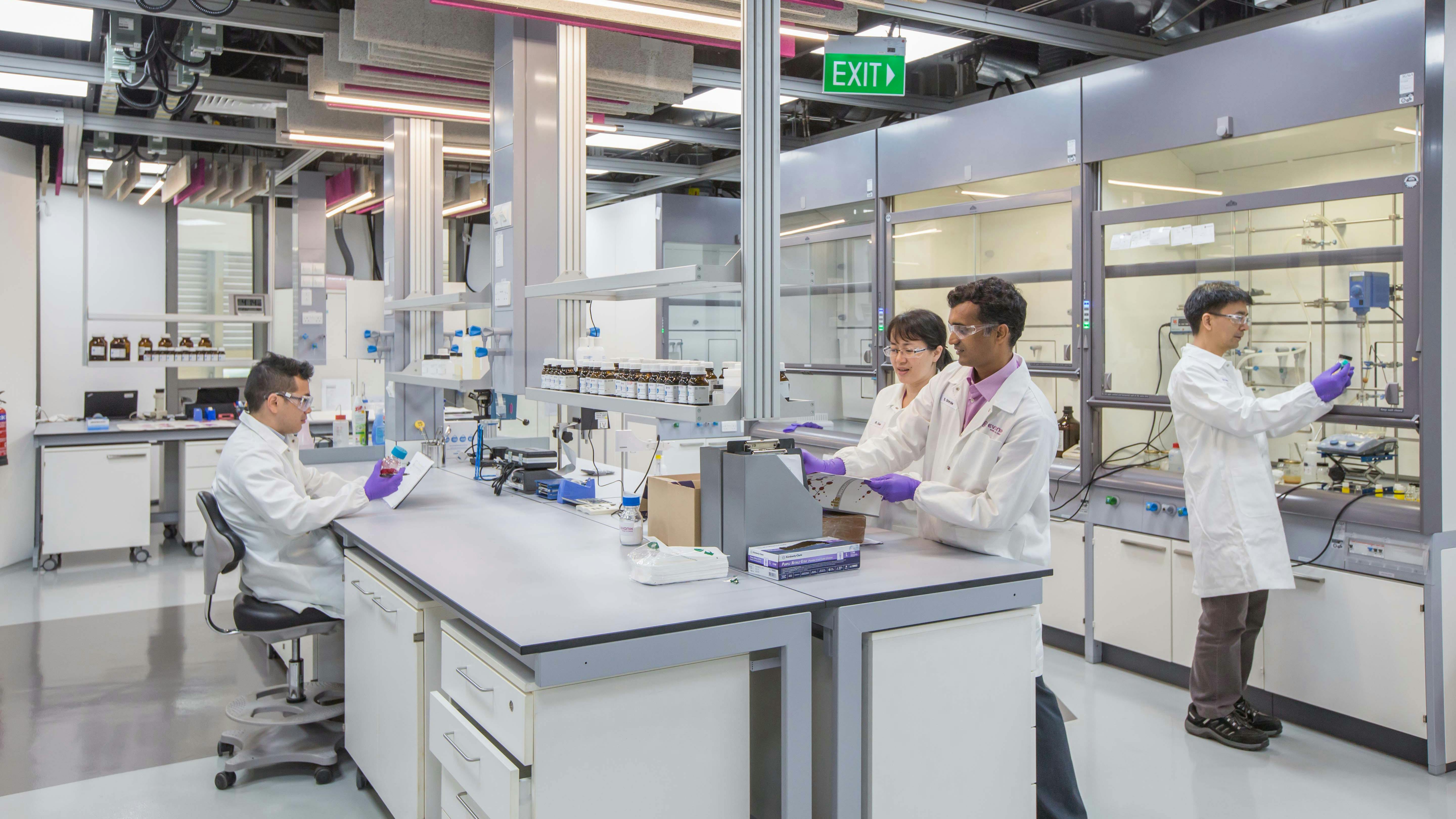 Scientists working in lab at Evonik Asia Research Hub in Singapore