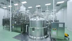 Large stainless steel bioreactor tanks and piping systems inside a pharmaceutical GMP manufacturing cleanroom at Altruist Biologics facility.