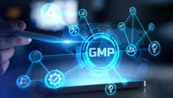 A hand points to a glowing digital 'GMP' network diagram floating above a smartphone screen.