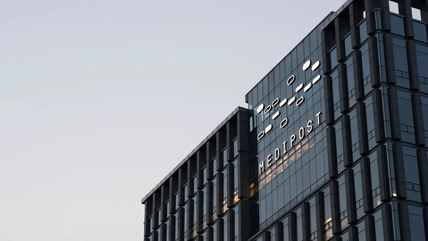 Medipost logo on building headquarters
