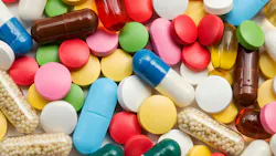 Pile of various colorful pill tablets