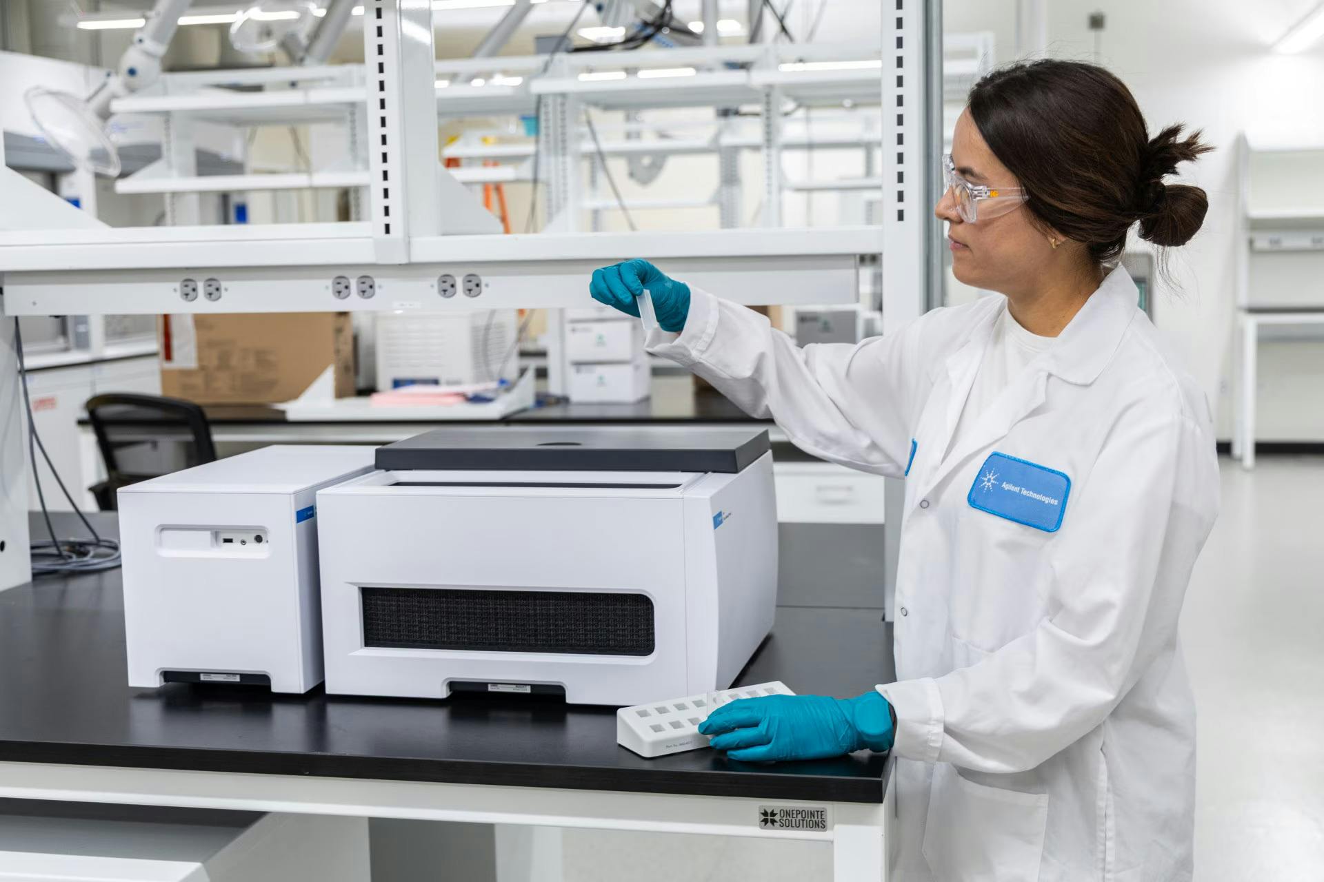A scientist uses an Agilent Cary 3500 UV-Vis spectrophotometer to characterize oligonucleotide samples in the new Agilent laboratory in Boulder, Colorado.