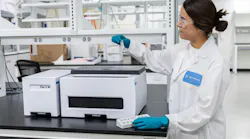 A scientist uses an Agilent Cary 3500 UV-Vis spectrophotometer to characterize oligonucleotide samples in the new Agilent laboratory in Boulder, Colorado.