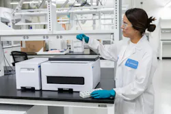 A scientist uses an Agilent Cary 3500 UV-Vis spectrophotometer to characterize oligonucleotide samples in the new Agilent laboratory in Boulder, Colorado.