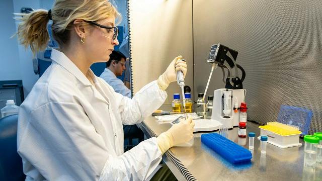 Charles River scientist conducts test