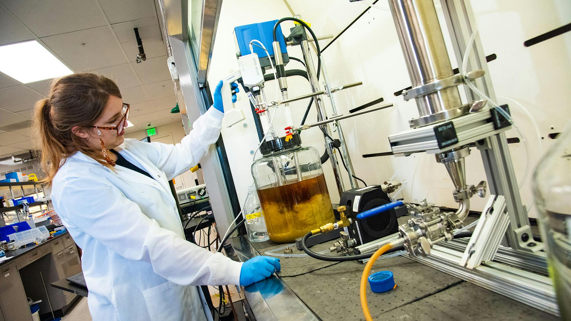 Female scientist in Antheia DSP lab